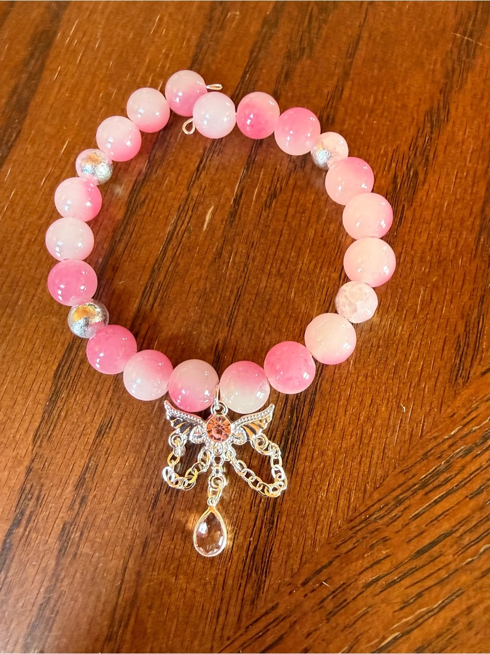 Pink Beaded Charm Bracelet with Silver Angel Wings Accent